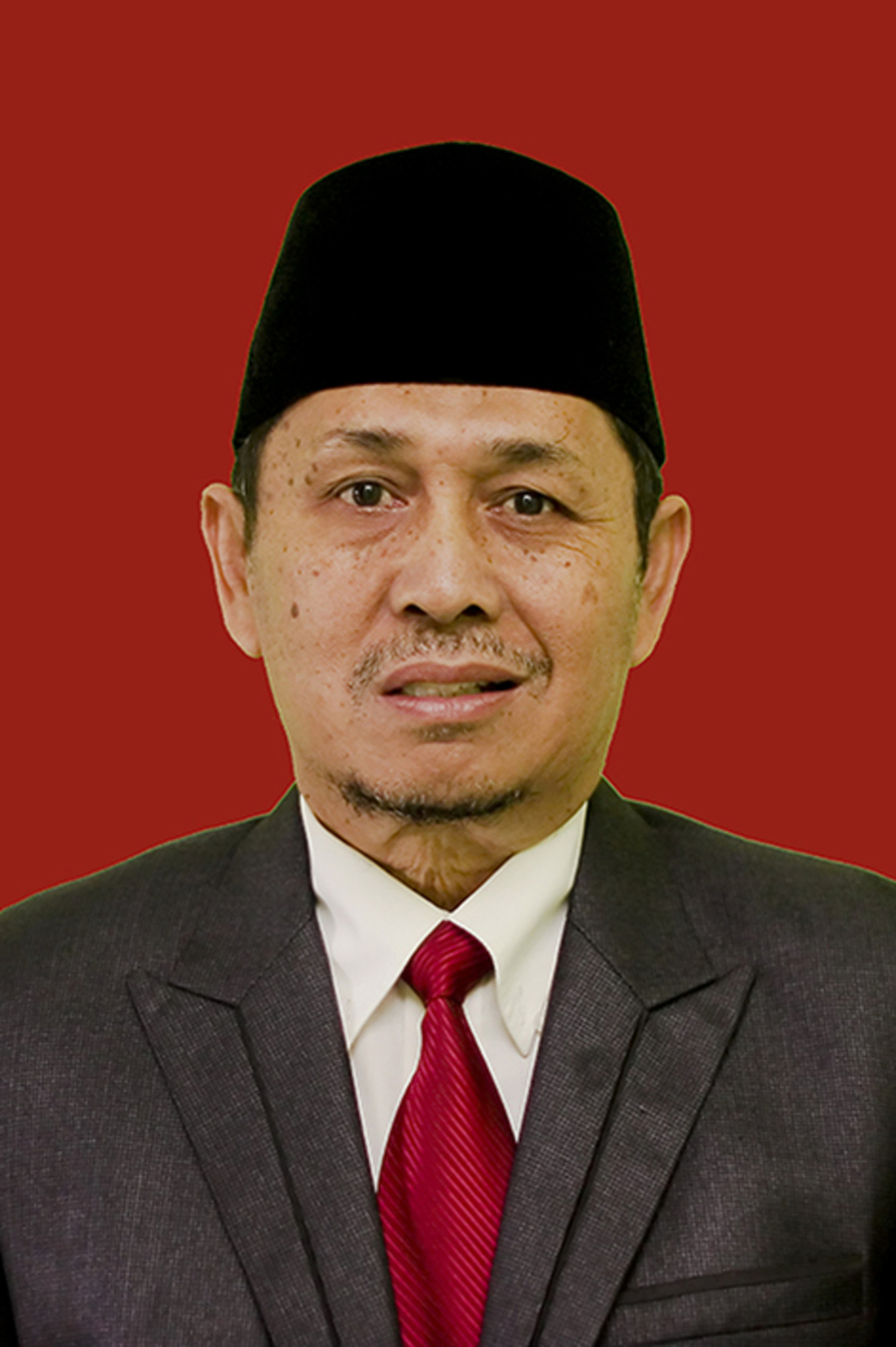 Drs. MUHAMMAD YAMIN, M.H.